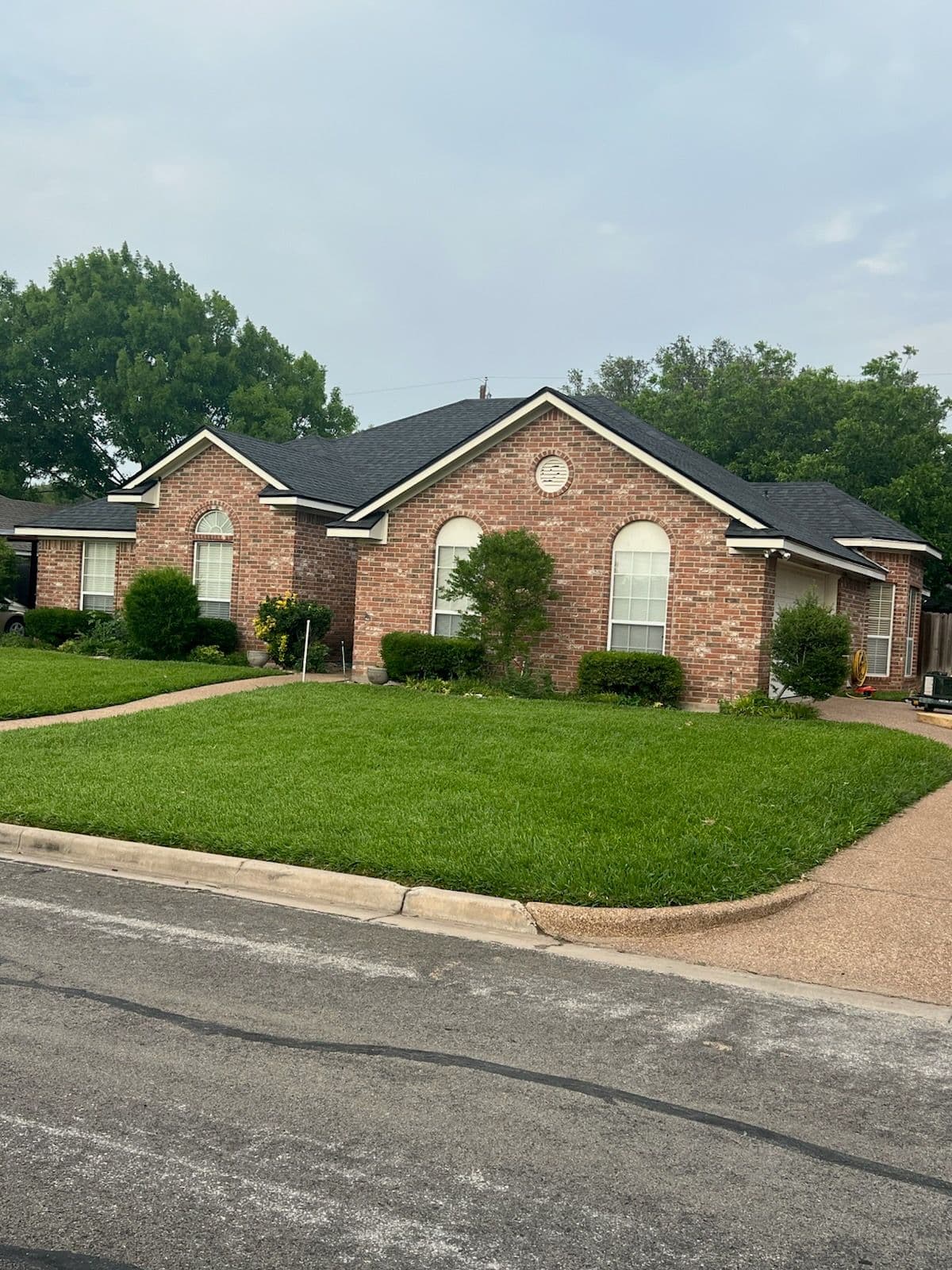 Project Stylish Roof Upgrade in Rustic Black Shingles image